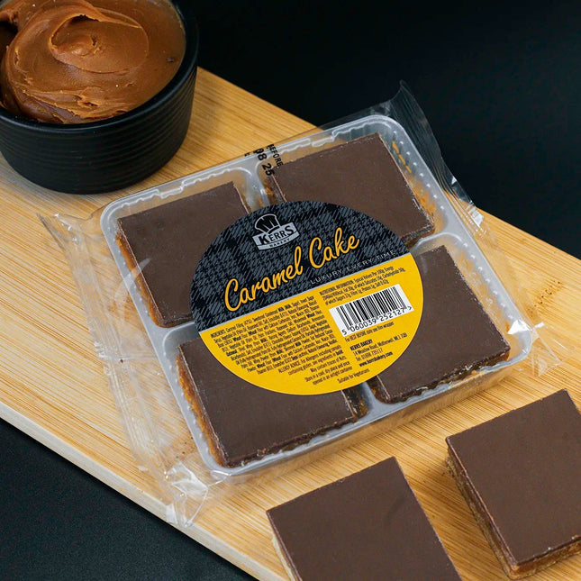 Caramel cake slices with packaging on a wooden board